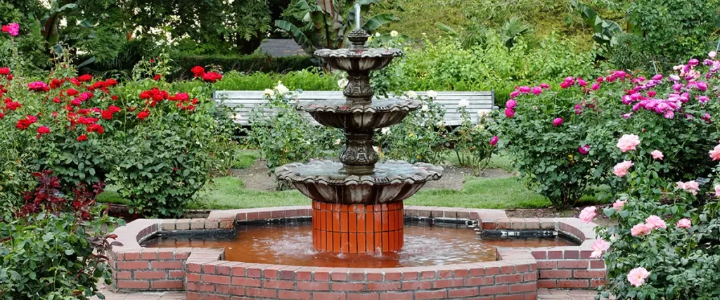 Brick garden fountain with tiered water flow